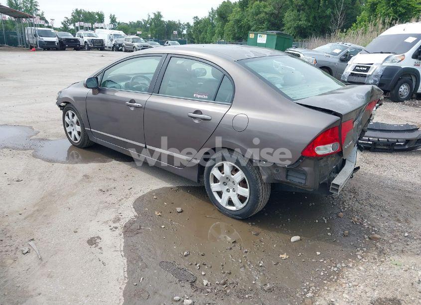 Photo 3 of 2011 Honda Civic LX (VIN 2HGFA1F55BH511462)