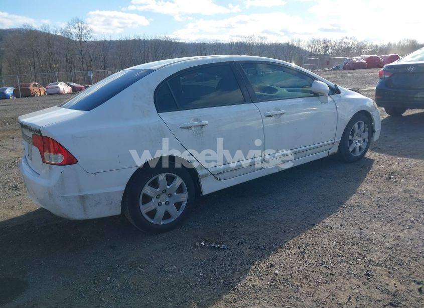 Photo 4 of 2011 Honda Civic LX (VIN 2HGFA1F55BH527614)