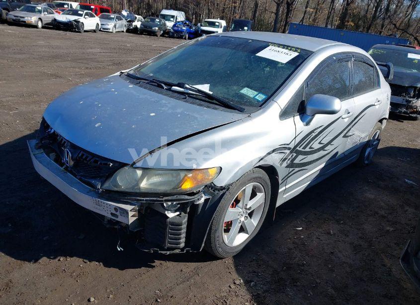 Photo 2 of 2011 Honda Civic LX (VIN 2HGFA1F56BH303820)