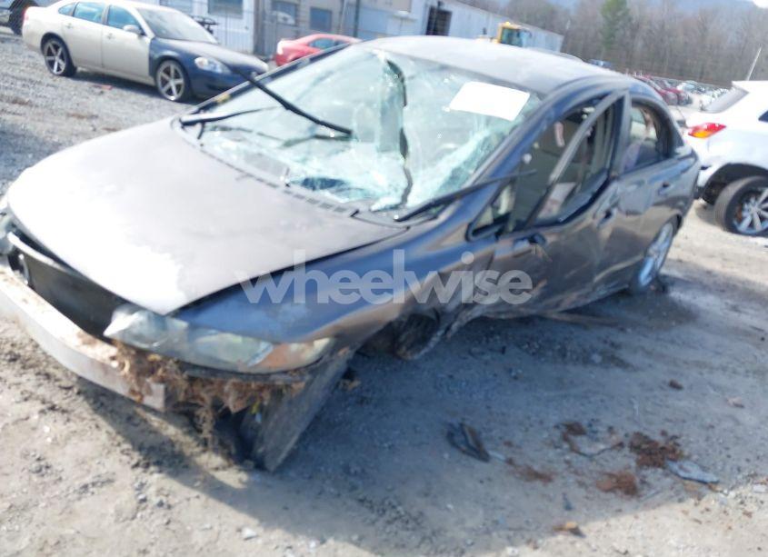 Photo 2 of 2010 Honda Civic LX (VIN 2HGFA1F57AH529038)