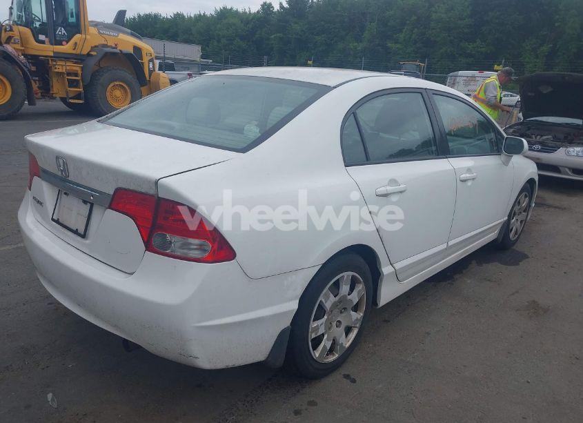 Photo 4 of 2010 Honda Civic LX (VIN 2HGFA1F57AH559592)