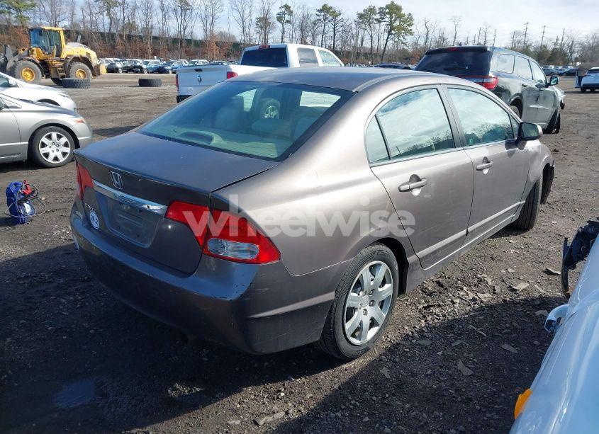 Photo 4 of 2010 Honda Civic LX (VIN 2HGFA1F57AH582595)