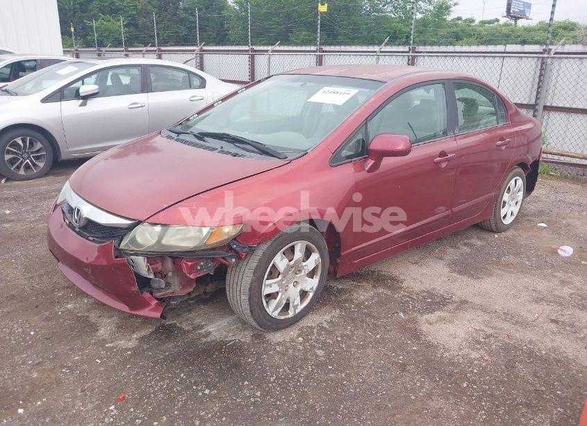 Photo 2 of 2011 Honda Civic LX (VIN 2HGFA1F57BH506098)