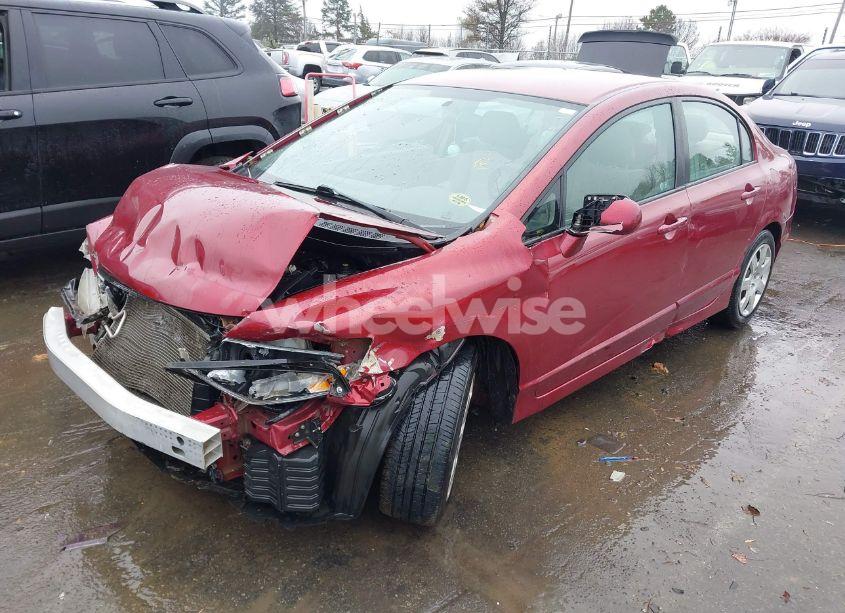 Photo 2 of 2011 Honda Civic LX (VIN 2HGFA1F57BH528490)