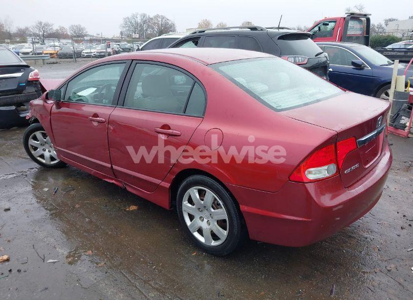 Photo 3 of 2011 Honda Civic LX (VIN 2HGFA1F57BH528490)