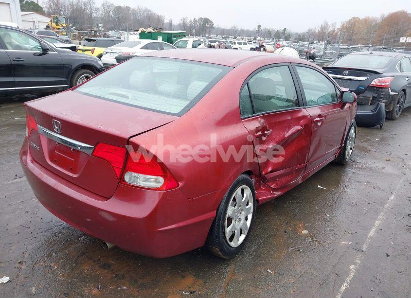 Photo 4 of 2011 Honda Civic LX (VIN 2HGFA1F57BH528490)