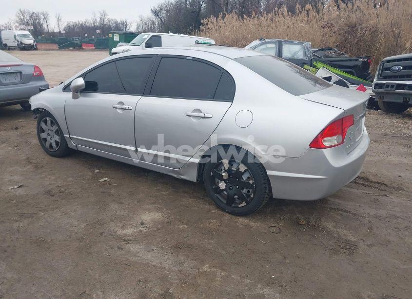 Photo 3 of 2011 Honda Civic LX (VIN 2HGFA1F57BH532989)