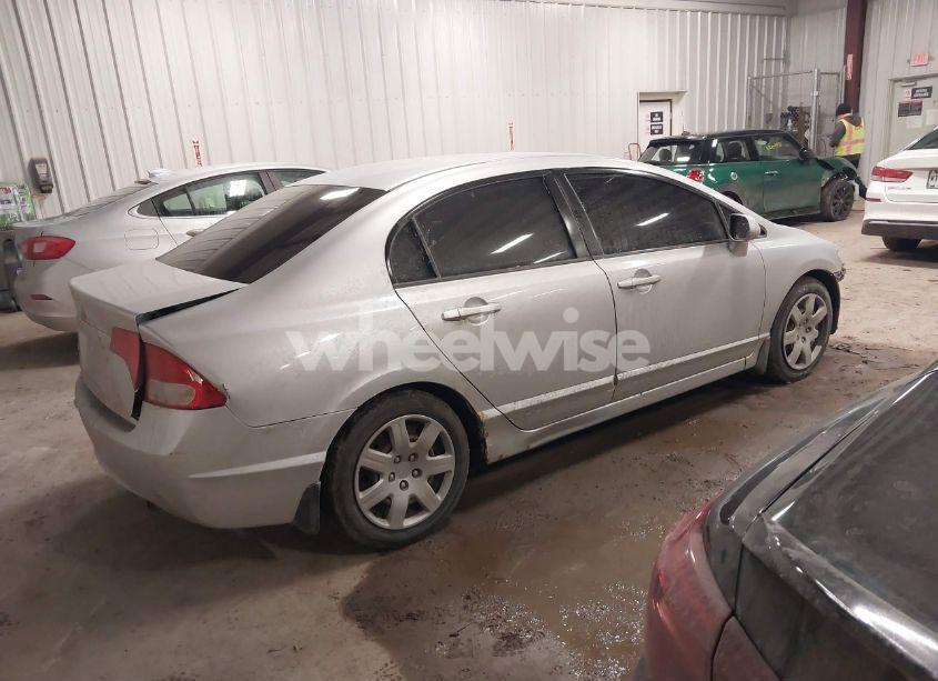 Photo 4 of 2011 Honda Civic LX (VIN 2HGFA1F57BH536184)