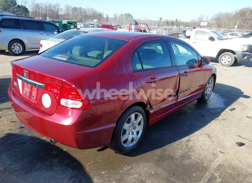 Photo 4 of 2011 Honda Civic LX (VIN 2HGFA1F57BH540882)