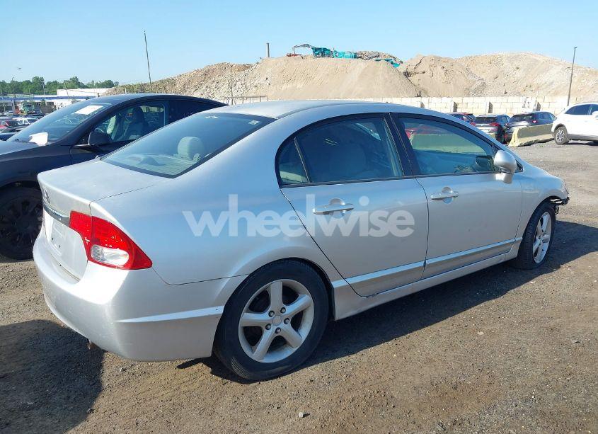 Photo 4 of 2011 Honda Civic LX (VIN 2HGFA1F58BH309635)