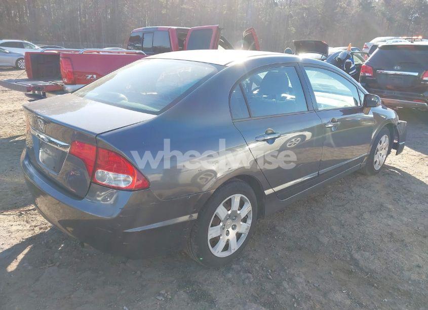 Photo 4 of 2011 Honda Civic LX (VIN 2HGFA1F59BH306629)