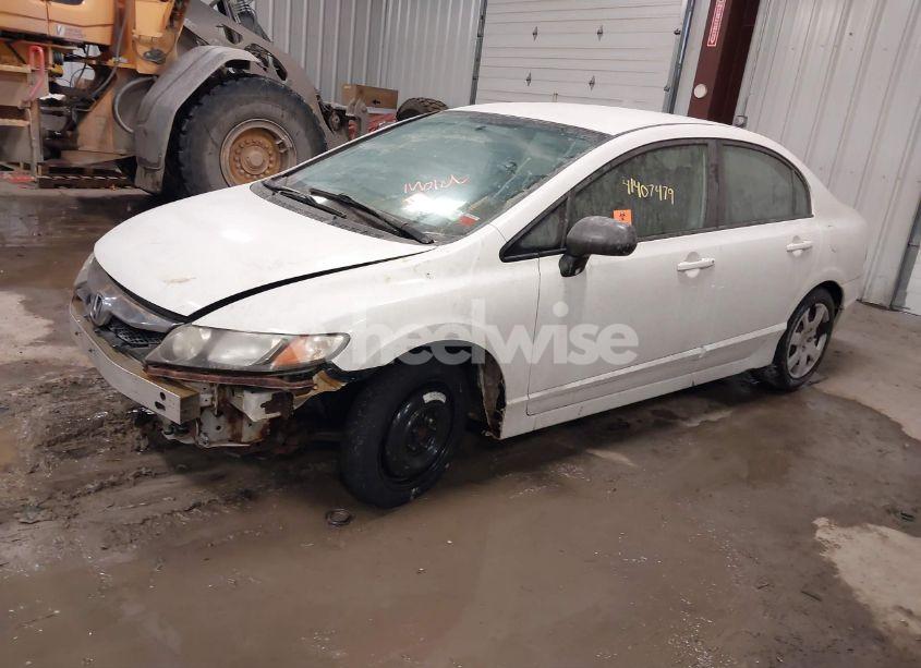 Photo 2 of 2011 Honda Civic LX (VIN 2HGFA1F59BH525915)