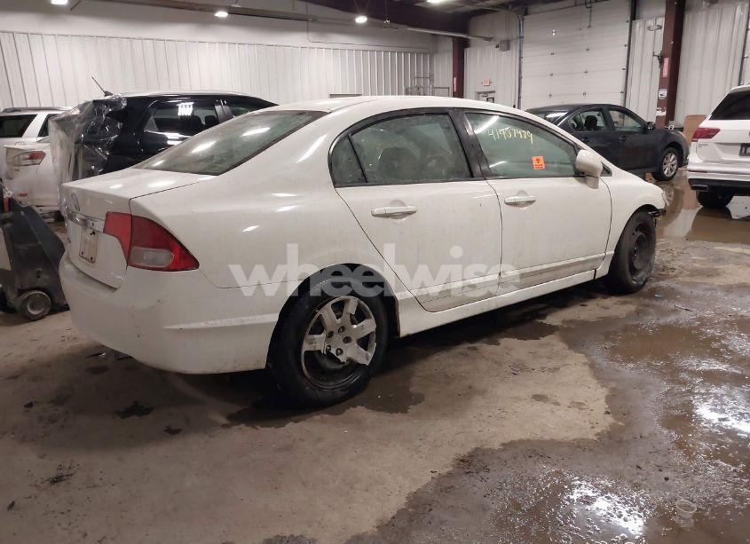 Photo 4 of 2011 Honda Civic LX (VIN 2HGFA1F59BH525915)