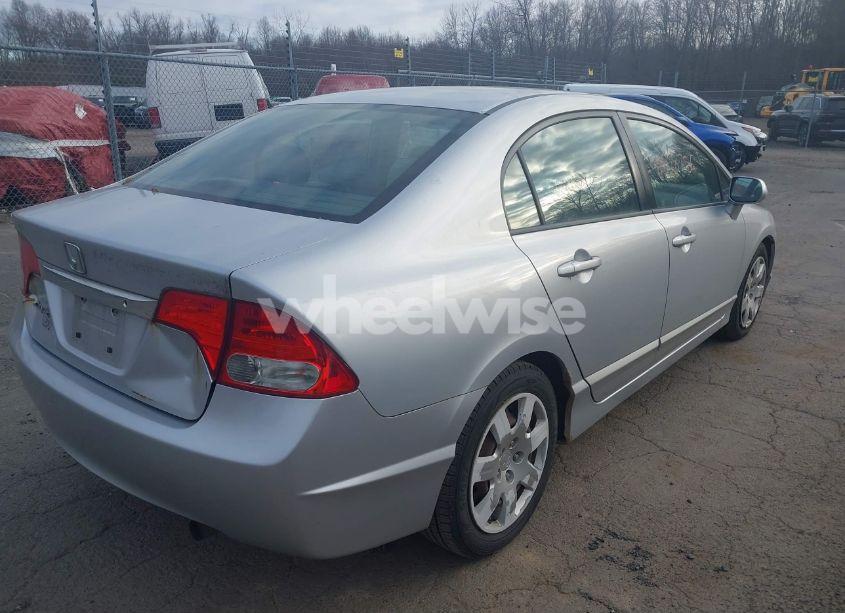 Photo 4 of 2010 Honda Civic LX (VIN 2HGFA1F5XAH575849)