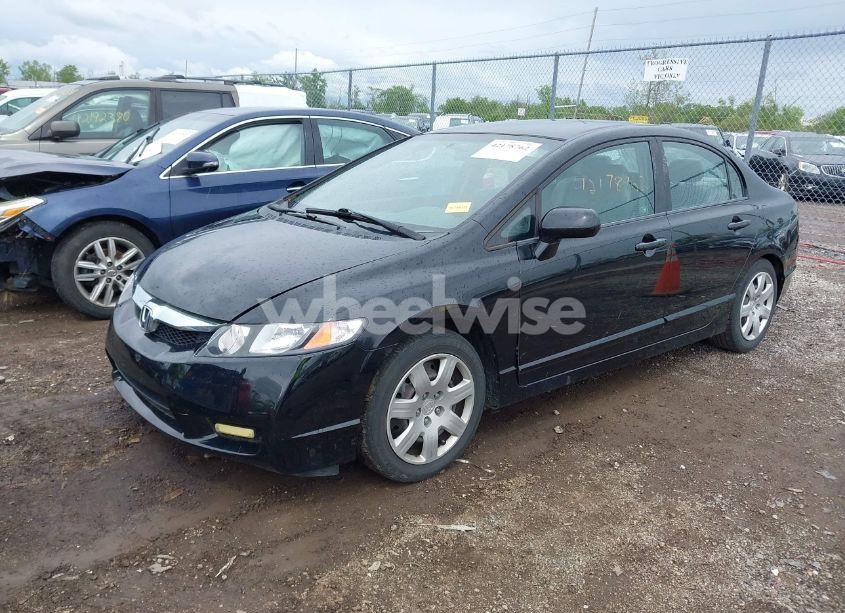 Photo 2 of 2011 Honda Civic LX (VIN 2HGFA1F5XBH307529)