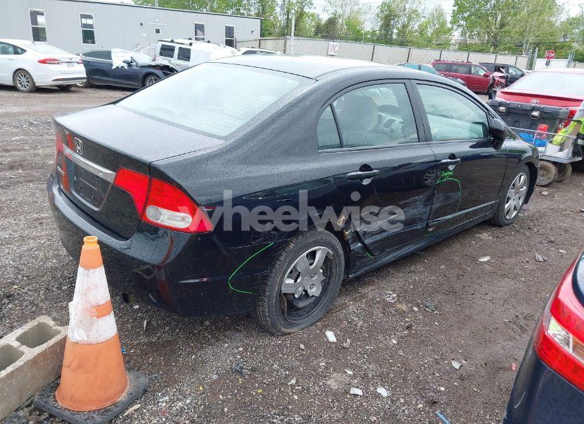 Photo 4 of 2011 Honda Civic LX (VIN 2HGFA1F5XBH307529)