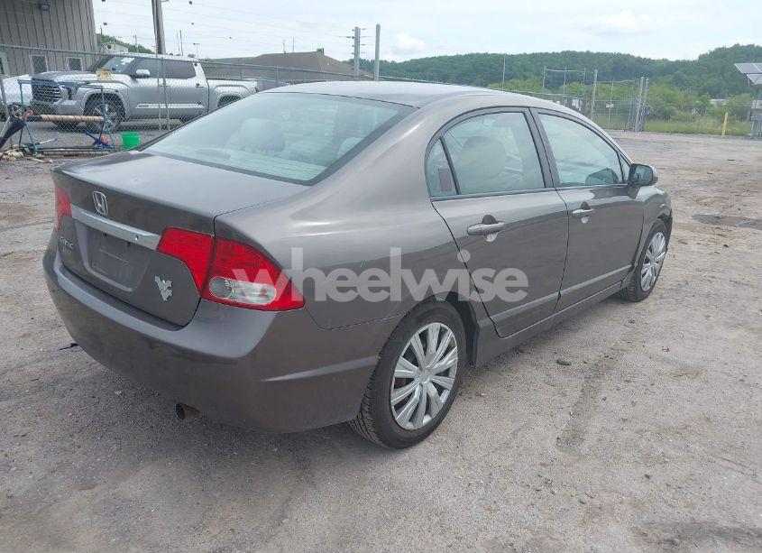 Photo 4 of 2011 Honda Civic LX (VIN 2HGFA1F5XBH511473)