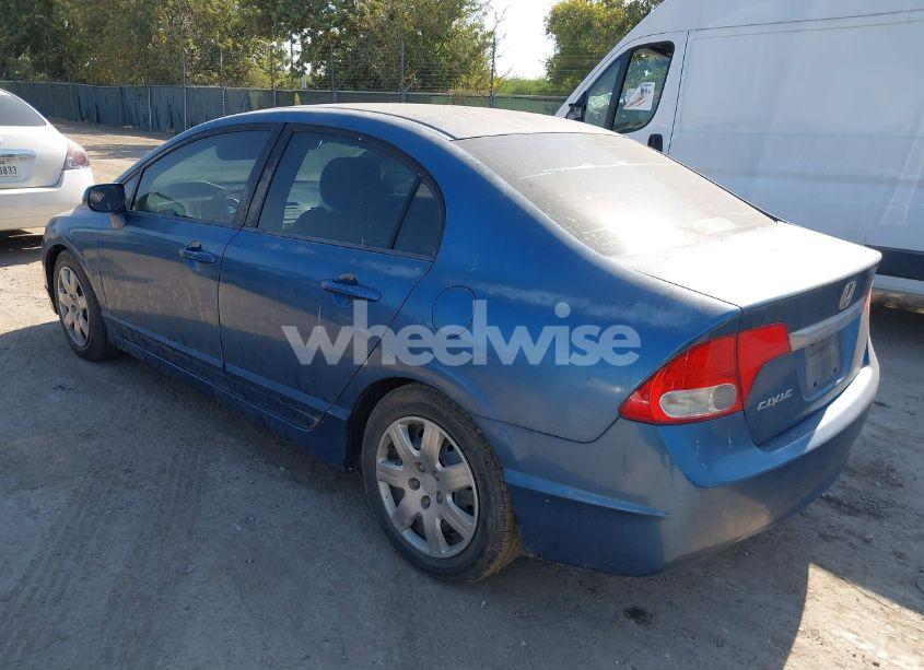 Photo 3 of 2011 Honda Civic LX (VIN 2HGFA1F5XBH515801)