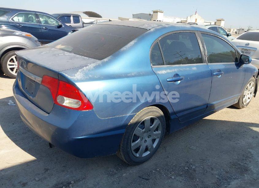 Photo 4 of 2011 Honda Civic LX (VIN 2HGFA1F5XBH515801)