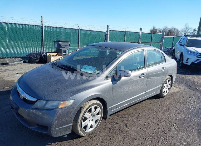 Photo 2 of 2011 Honda Civic LX (VIN 2HGFA1F5XBH532310)
