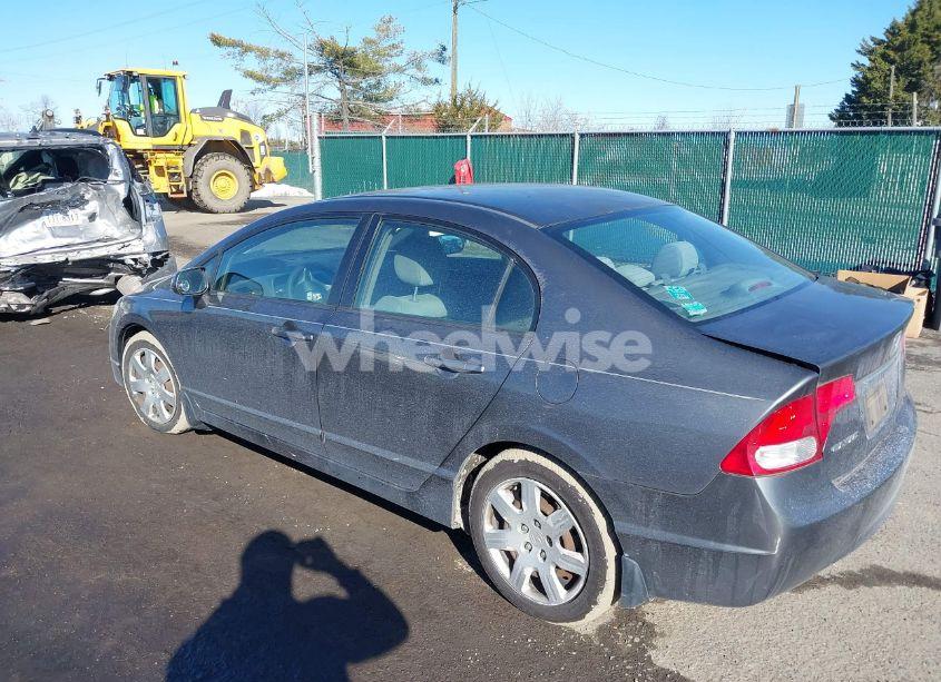 Photo 3 of 2011 Honda Civic LX (VIN 2HGFA1F5XBH532310)