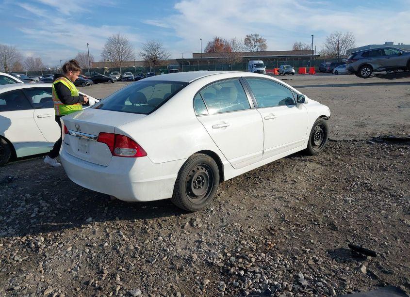 Photo 4 of 2011 Honda Civic LX (VIN 2HGFA1F5XBH538639)