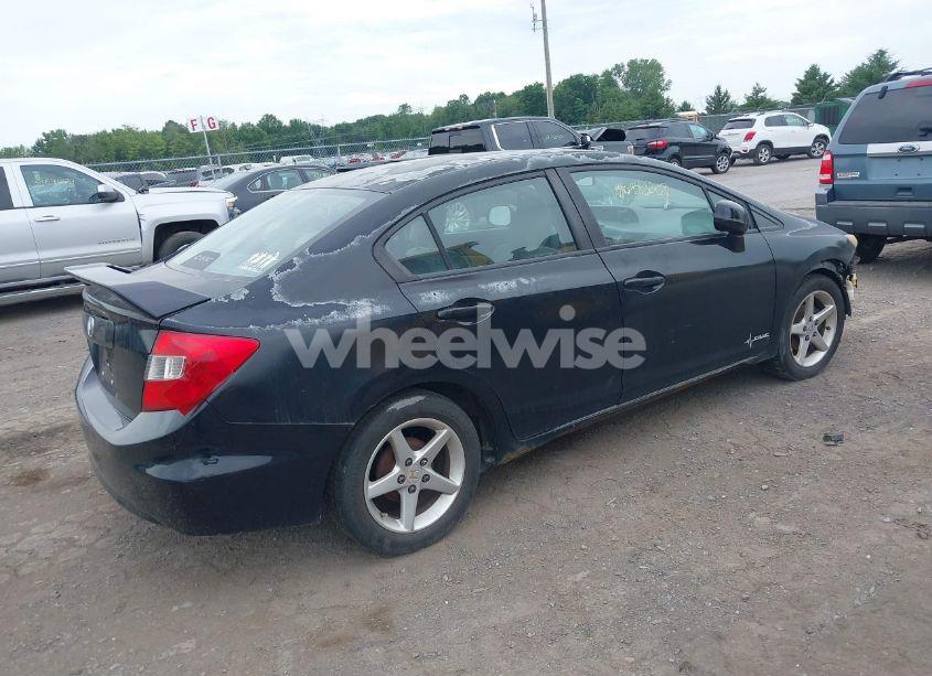 Photo 4 of 2012 Honda Civic LX (VIN 2HGFB2E56CH503408)