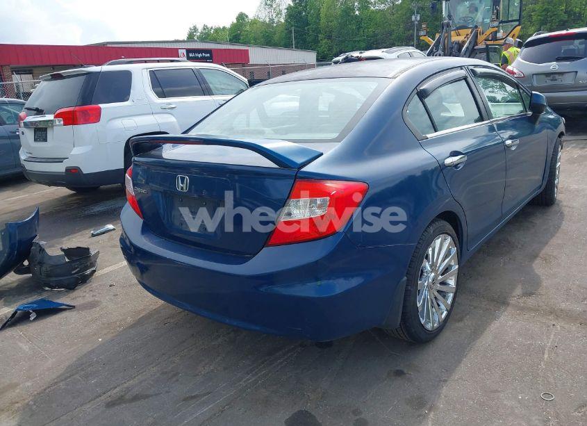 Photo 4 of 2012 Honda Civic LX (VIN 2HGFB2F50CH551341)