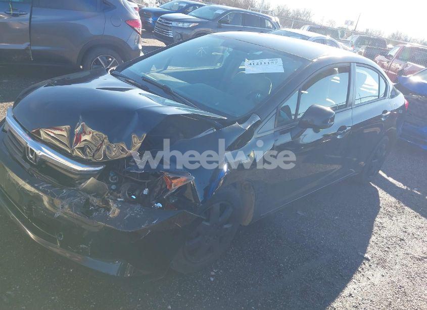Photo 2 of 2012 Honda Civic SDN LX (VIN 2HGFB2F51CH527243)