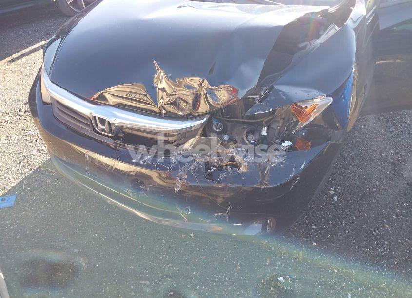 Photo 6 of 2012 Honda Civic SDN LX (VIN 2HGFB2F51CH527243)