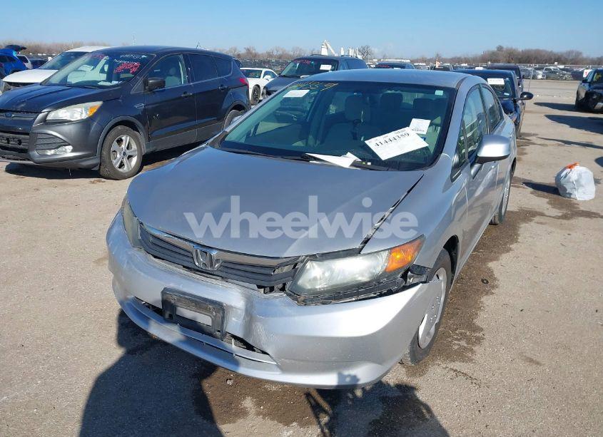 Photo 2 of 2012 Honda Civic LX (VIN 2HGFB2F51CH611868)
