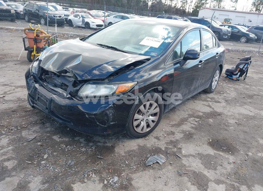 Photo 2 of 2012 Honda Civic SDN LX (VIN 2HGFB2F52CH611975)