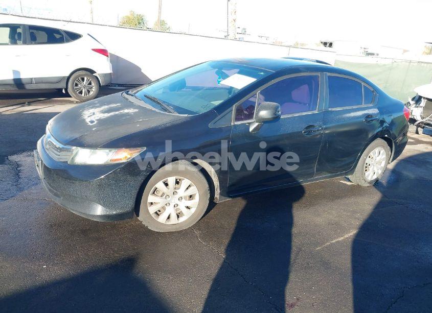Photo 2 of 2012 Honda Civic SDN LX (VIN 2HGFB2F53CH520360)