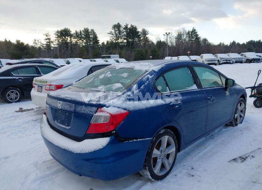 Photo 4 of 2012 Honda Civic LX (VIN 2HGFB2F53CH575911)