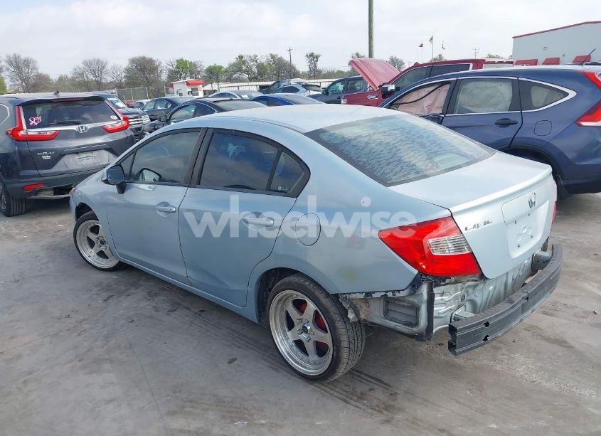 Photo 3 of 2012 Honda Civic LX (VIN 2HGFB2F54CH539841)