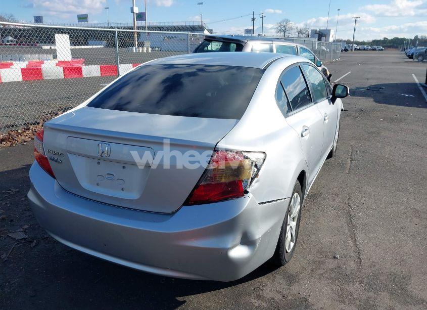 Photo 4 of 2012 Honda Civic LX (VIN 2HGFB2F54CH606759)