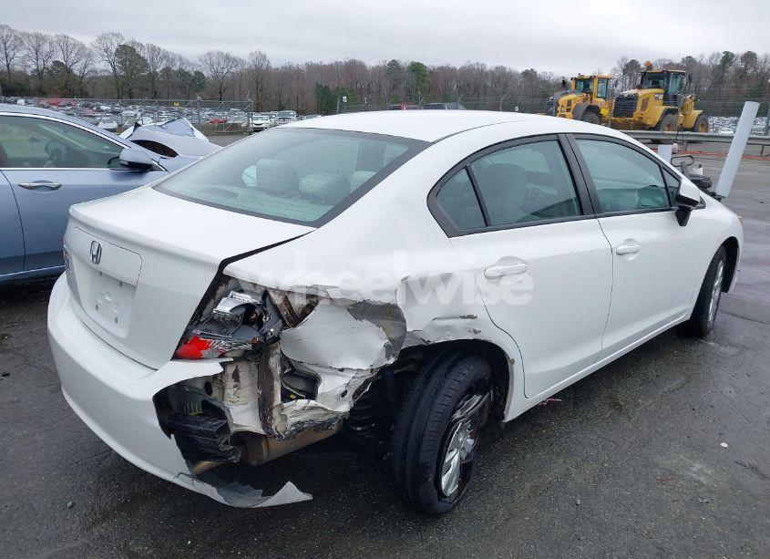 Photo 4 of 2012 Honda Civic LX (VIN 2HGFB2F55CH581337)