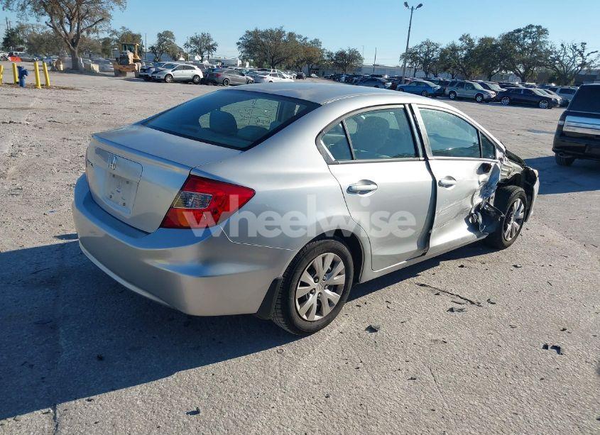 Photo 4 of 2012 Honda Civic LX (VIN 2HGFB2F56CH320203)