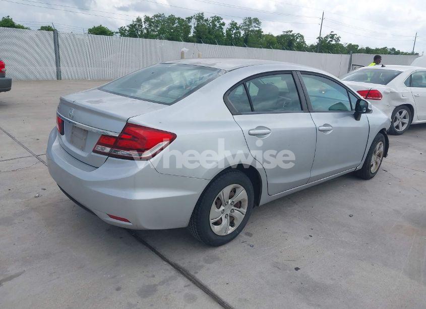 Photo 4 of 2013 Honda Civic LX (VIN 2HGFB2F56DH525571)