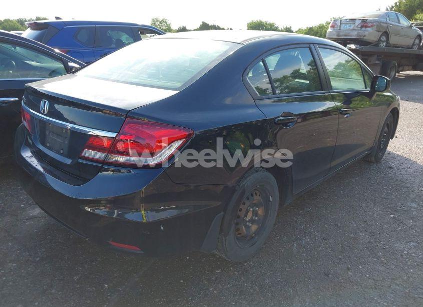 Photo 4 of 2013 Honda Civic LX (VIN 2HGFB2F56DH566203)