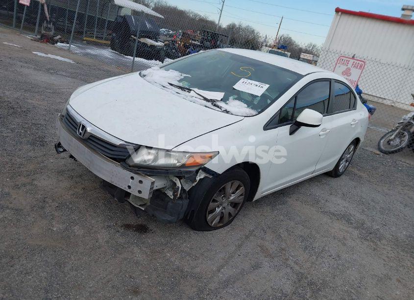Photo 2 of 2012 Honda Civic SDN LX (VIN 2HGFB2F57CH310361)