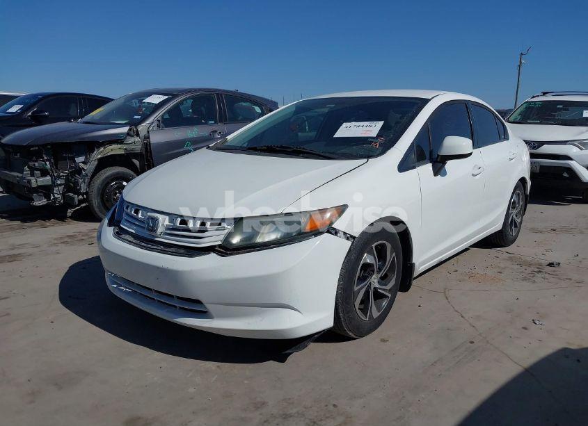 Photo 2 of 2012 Honda Civic SDN LX (VIN 2HGFB2F57CH323580)