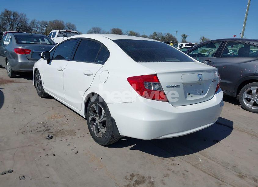 Photo 3 of 2012 Honda Civic SDN LX (VIN 2HGFB2F57CH323580)