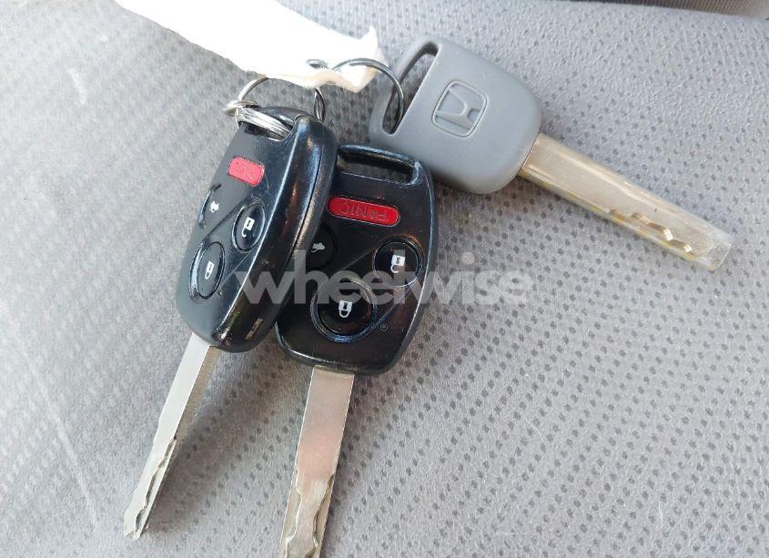 Photo 11 of 2012 Honda Civic SDN LX (VIN 2HGFB2F57CH330657)