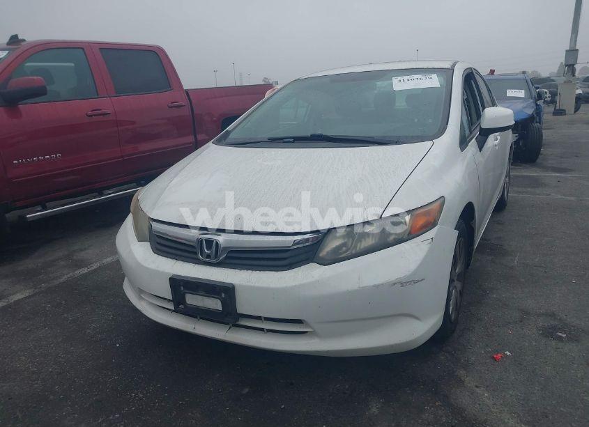 Photo 2 of 2012 Honda Civic SDN LX (VIN 2HGFB2F57CH330979)