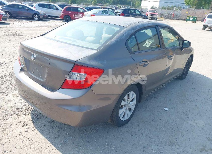 Photo 4 of 2012 Honda Civic LX (VIN 2HGFB2F57CH539137)