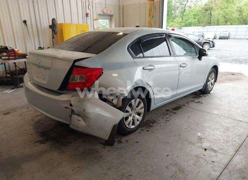 Photo 4 of 2012 Honda Civic LX (VIN 2HGFB2F57CH579010)