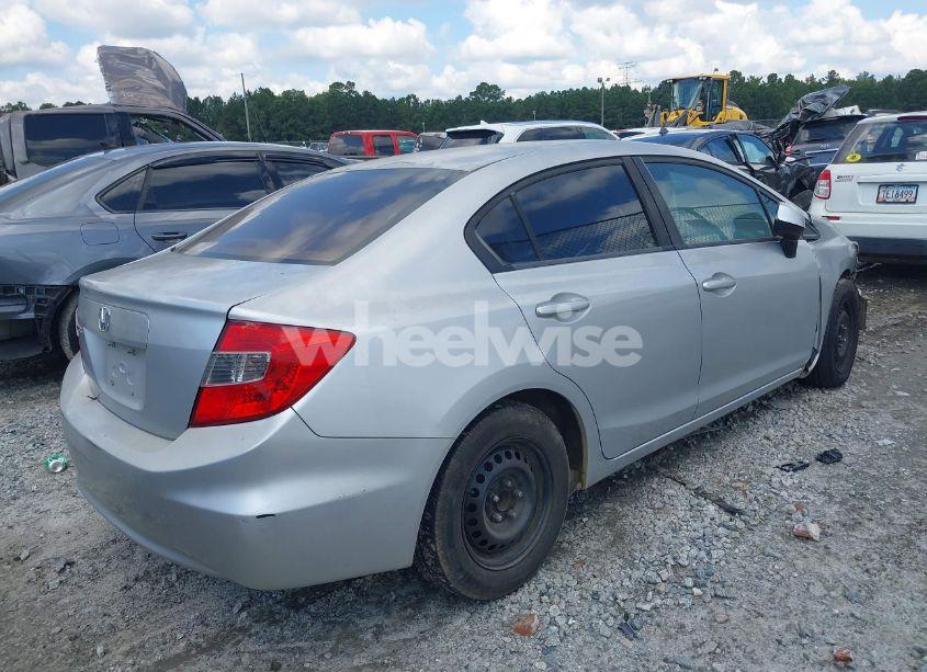 Photo 4 of 2012 Honda Civic LX (VIN 2HGFB2F57CH598446)