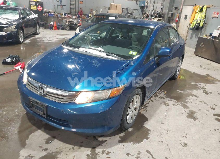 Photo 2 of 2012 Honda Civic SDN LX (VIN 2HGFB2F58CH544721)