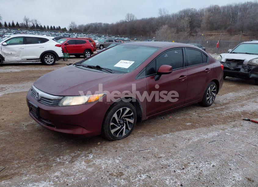 Photo 2 of 2012 Honda Civic SDN LX (VIN 2HGFB2F58CH585382)